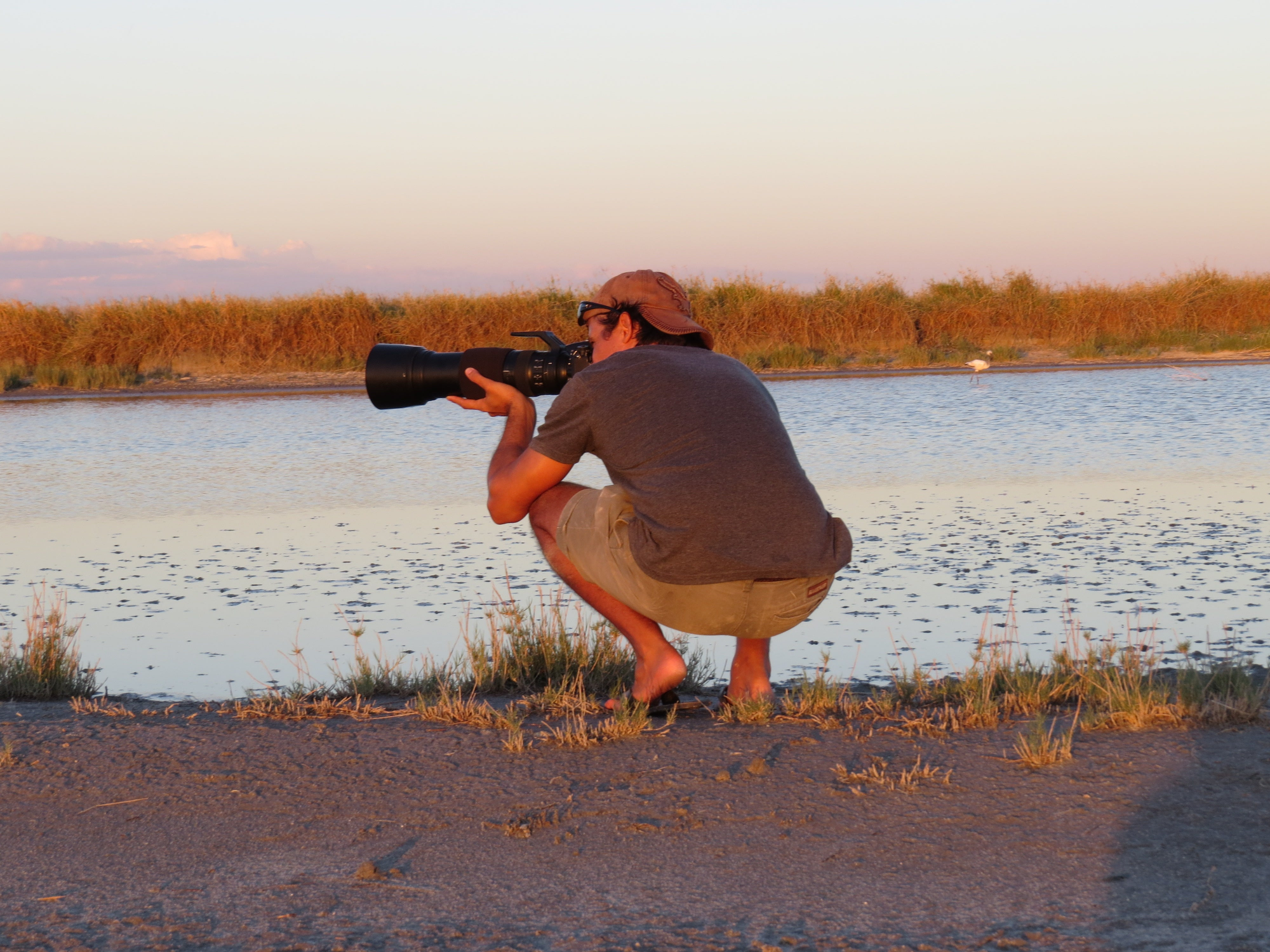 Devon Jenkin in photographic crouch