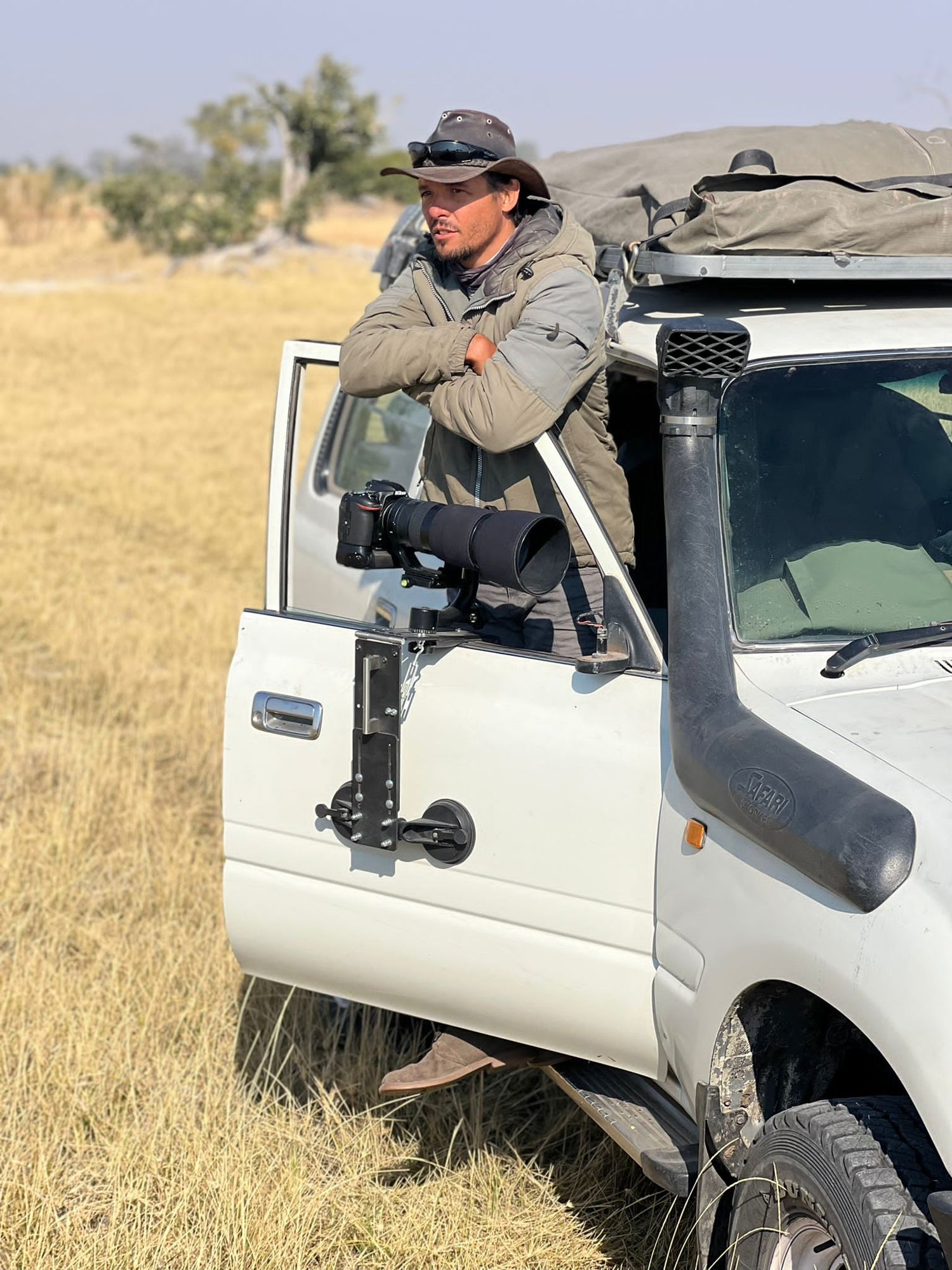 Dvon Jenkin with a camera on a vehicle in a natural setting