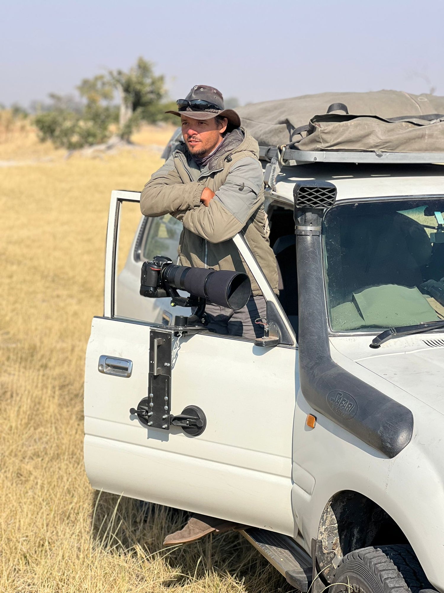 Devon Jenkin photographed on safari with vehicle
